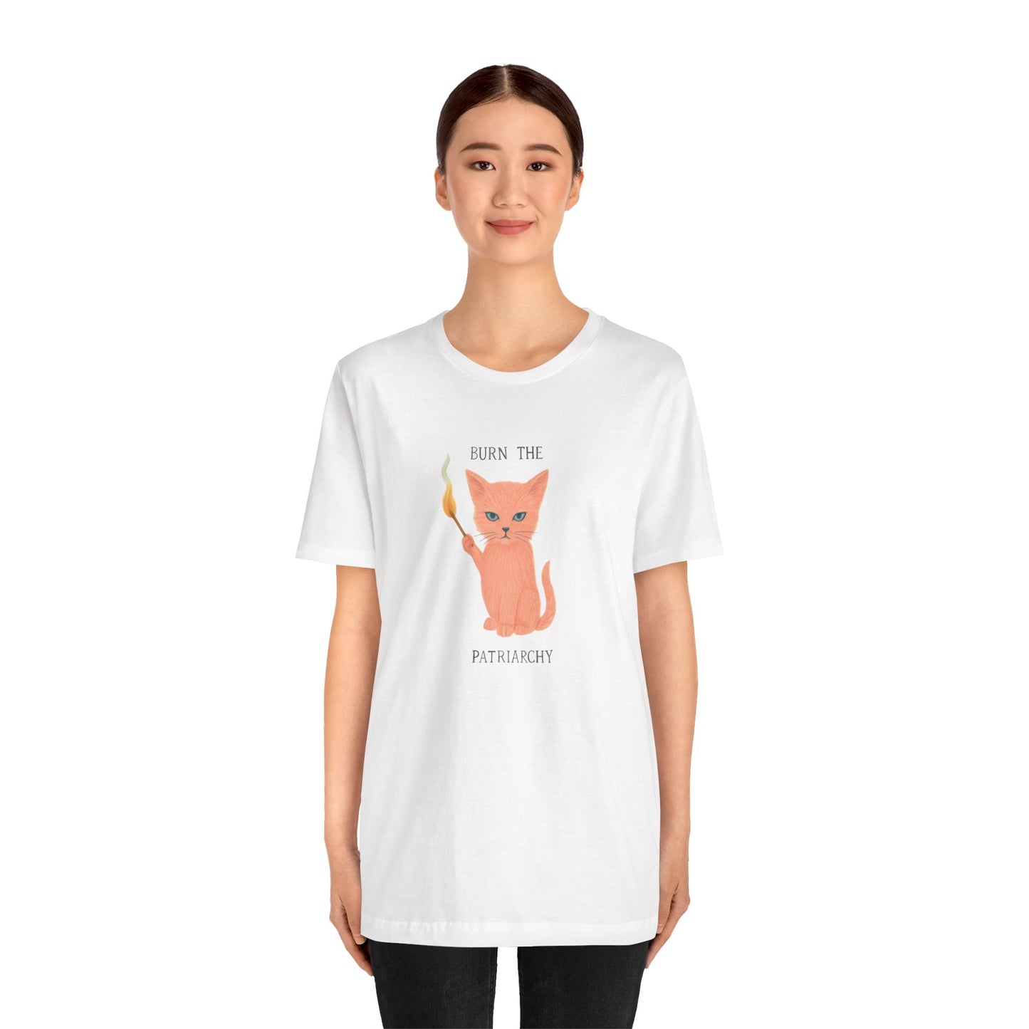Model wearing Burn the Patriarchy shirt – pink cat holding matchstick
